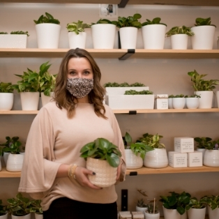 woman selling plants