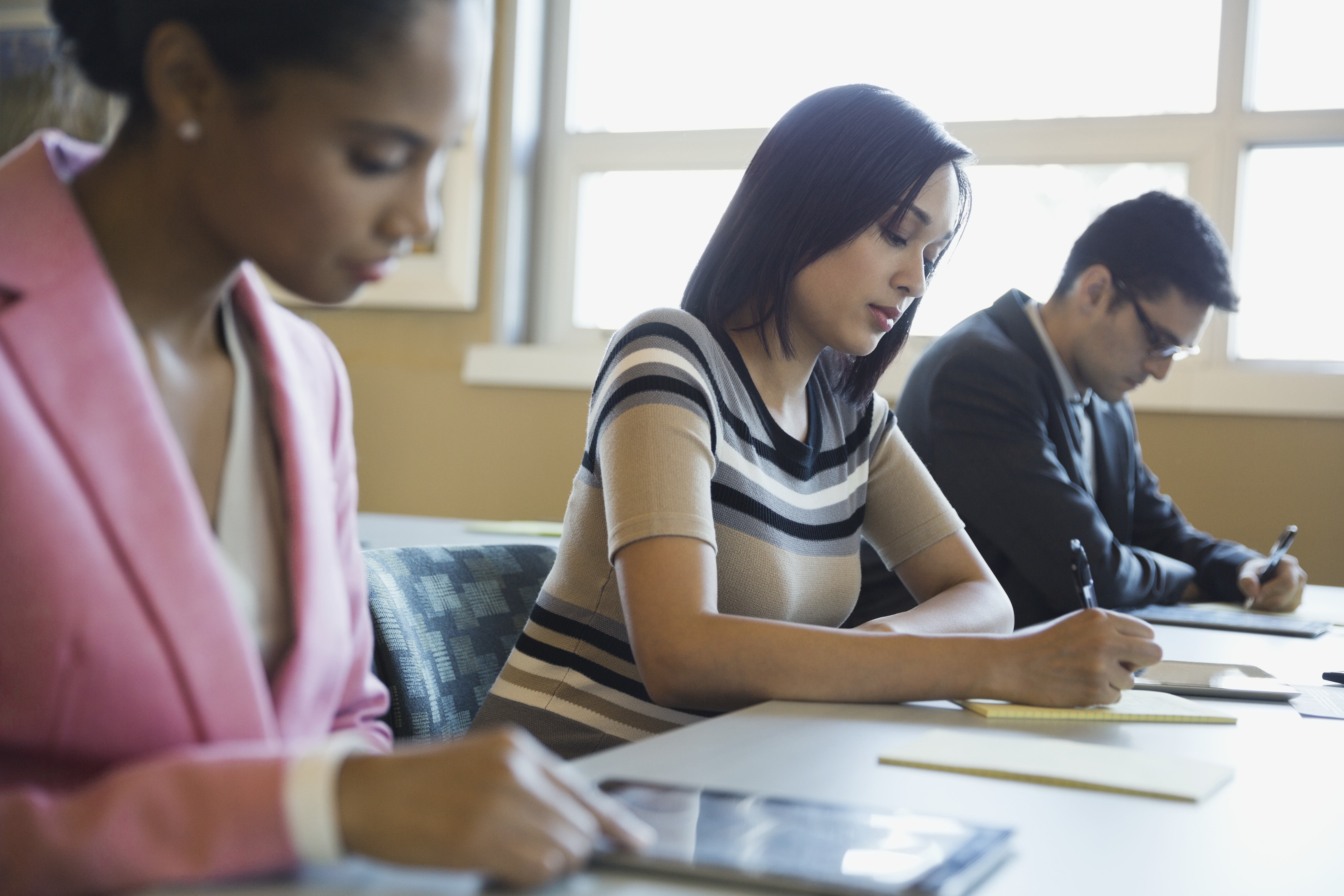 Continuing Education Students sitting at desk in classroom