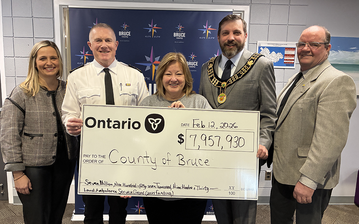 A presentation of a novelty cheque for $7,957,930 of funding for Bruce County’s Land Ambulance Service Grant. From left – Christine MacDonald, CAO; Steve Schaus, Director/Chief, Paramedic Services; the Honourable Lisa Thompson, MPP for Huron-Bruce; Luke Charbonneau, Warden; and Don Murray, Deputy Warden.