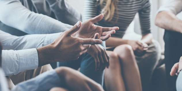 a group of people having a discussion